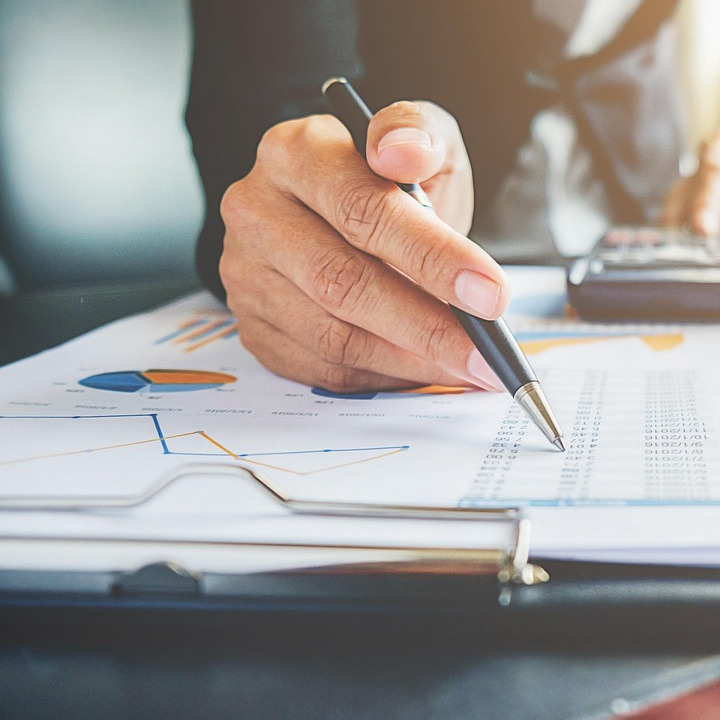 accounting office team calculator tax